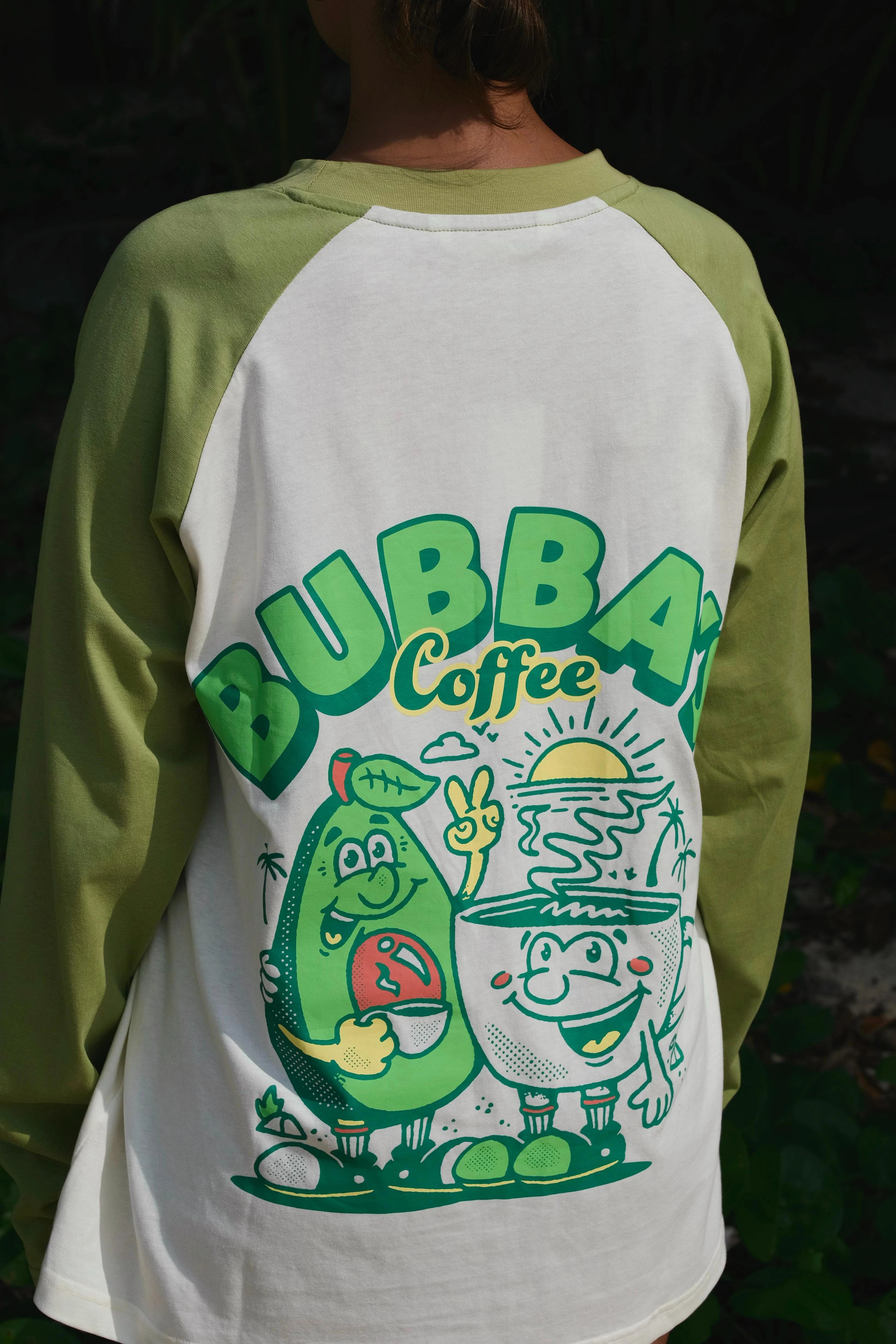 Green and white baseball shirt with 'Bubba Coffee' graphic design on a dark background
